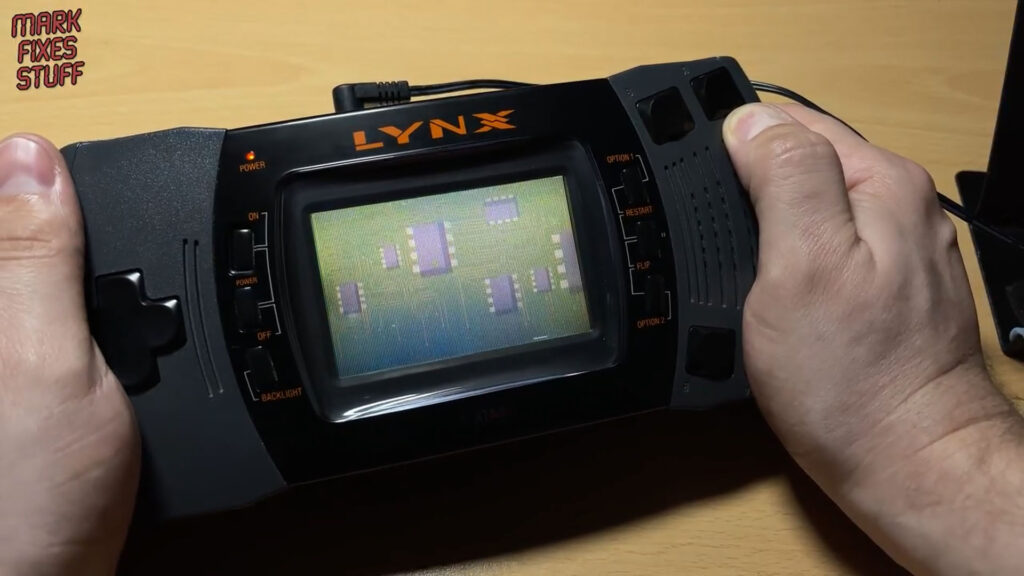 Playing a repaired Atari Lynx II 2 with the original screen in a Mark Fixes Stuff video