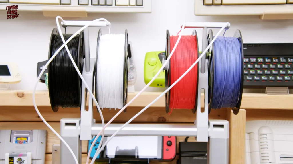 Four filament spools mounted on top of the Anycubic Kobra X with tubes feeding the ACE Gen2 print head