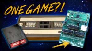 Intellivision console with a soot damaged Frog Bog cartridge and a Raspberry Pi Pico multi-cart PCB, captioned One Game?!