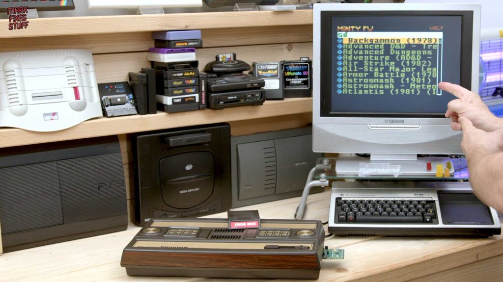 Intellivision connected to a monitor showing the Minty firmware game list running from a Pi Pico multi-cart