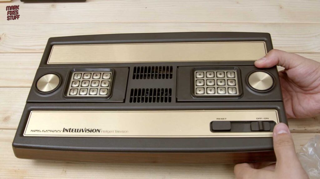 Mattel Intellivision console front panel with both controller keypads and disc controllers